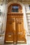 Old ornate door in Paris - typical old apartment buildiing.