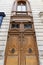 Old ornate door in Paris - typical old apartment buildiing.