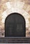 Old ornate wooden doors in Valladolid, Spain.