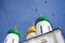 Old orthodox church golden and green cupolas.