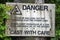 Old Overhead Electric Cable Warning Sign for Anglers