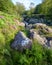 The old packhorse bridge known as Birk`s Bridge across the river Duddon near Seathwaite in the Lake District National Park