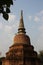 Old Pagoda With Bodhi Leaves And Sunlight