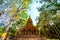 Old pagoda with teak trees in Pa Sak temple