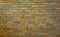 Old Pale Orange Green Brick Wall Texture. Vintage Background