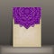 Old paper card with purple floral circular pattern