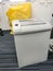 Old paper shredding machine in office for classified information and docuements