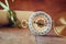 Old parchment and antique compass on wooden table