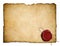 Old parchment paper or letter with red wax seal