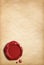 Old parchment paper with red wax seal