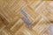 Old parquet floor with scratch marks