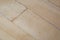 Old parquet or laminate flooring deformed by water exposure. water exposure,