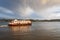 Old passenger boat cacilheiro crossing the Tagus River in the city of Lisbon