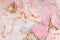 Old peeling weathered outdated paint pink abstract pattern wall texture background