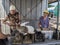 Old people selling living rabbits in cages on Dniepropetrovsk main market, slaviansky, during a warm afternoon