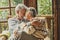 Old people senior man and woman in love and tenderness at home. Mature elderly couple enjoy relationship hugging and caring each
