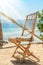Old photo Stylishly beautiful chair on the sea nature landscape background