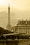 Old photo with vintage cannons and Eiffel tower