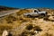 Old pickup truck on desert roadsid. Travel by car. Tourism and journey theme. Transportation, adventure concept. Summer holiday
