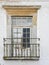 Old picturesque crumbling balcony window