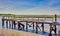 Old Pier in Disrepair Over Marsh