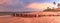 Old pier in the ocean at Port Royal Beach at sunrise