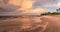 Old pier in the ocean at Port Royal Beach at sunrise