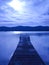 Old pier which floats in the winter lake