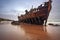 old pirate shipwreck washed ashore on a beach