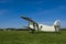 Old plane on a green field