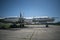 Old plane. Hull, chassis, engines and propellers of an old plane. large, cargo, military aircraft with a large payload