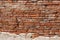 Old plastered brick wall background texture