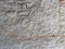 Old plastered stone wall background, plaster texture