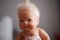 Old plastic baby child doll family lifestyle background
