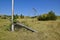 Old playground with teeter totter and swingset