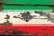 Old plumbed Iran flag on wood.