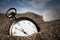 Old pocket watch buried in sand