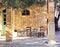Old porch and yard with olive tree