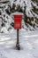 Old postbox in winter