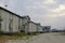 Old poverty wood two-storied house with dark sky