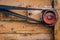 Old pulley in an old agricultural machine. Threshing machine, pu