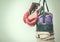 Old punching bag and boxing gloves