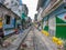 The Old Quarter, The Hanoi Street Train Tracks. Going through the narrow streets. life of locals on the street with a train