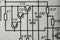 Old radio circuit printed on vintage paper electricity diagram as background. Electric radio scheme from USSR