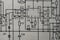 Old radio circuit printed on vintage paper electricity diagram as background. Electric radio scheme from USSR