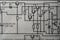 Old radio circuit printed on vintage paper electricity diagram as background. Electric radio scheme from USSR