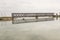 Old railway bridge over the river. Boat with fishermen on the water