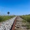 An old railway with a sign on the side that says 100