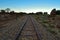 Old railway tracks and evening sky