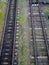 Old railway tracks. View from above. Railway in the moss. Road concept. Train station